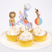 Roll up, Roll up, for a fabulous circus-themed party. This delightful Circus Parade cupcake kit will make the most amazing treats for the little birthday boy or girl and their guests. The kit has twenty-four fantastic toppers with four circus designs, including horses with paper tassels on their heads, and twenty-four shimmering gold foil cases.  Themed toppers with 24 gold foil cupcake cases Neon print & gold foil detail Pack of 24 toppers in 4 designs