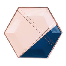 A modern, graceful color palette inset with fine rose gold trim, elevate your party with our colorblock hexagon party plates. Perfect for bridal showers, special birthdays, or gender reveal parties!  Colors: Pale pink, navy, rose gold foil Paper plates Approx. 10.5" corner to corner  8 Plates / pack 