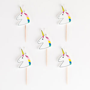 5 candles in the shape of a unicorn drawing by My Little Day.  These candles are perfect for a birthday party with the theme "unicorn" or "Enchanted Lands"! The colours of these candles are very unicorn suitable for a princess or fairy party in a wonderful and fairytale world! Unique candles for a magical birthday!  A candle measures 8.5 cm., 3 inches